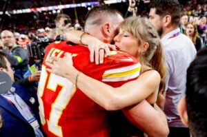 Why did people want my relationship with Travis Kelce to terminate; a true fans of mine should support my relationship and if you are happy about my relationship send me a love emoji